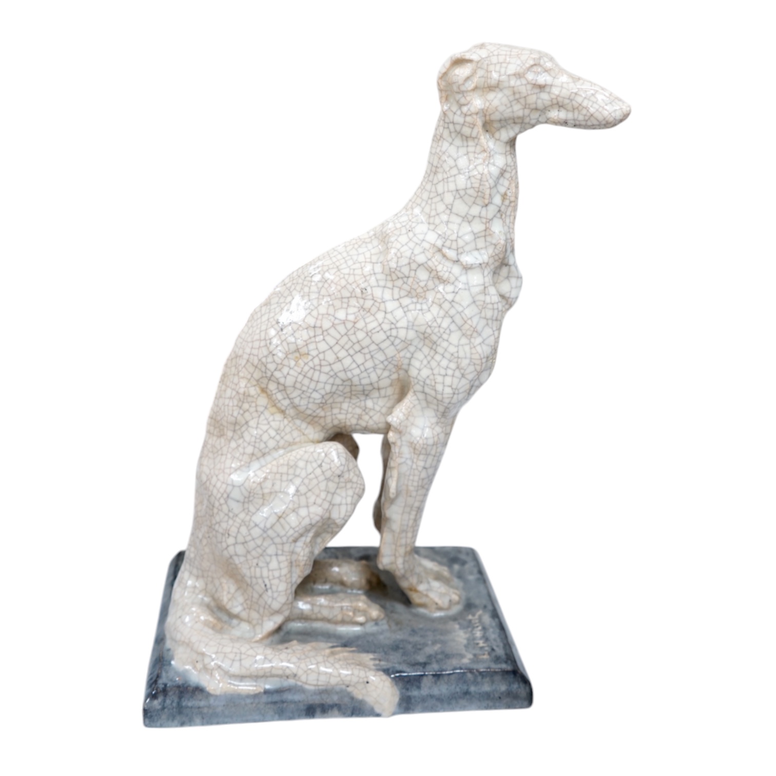 Louis Henri Nicot, Paris, a porcelain crackleglaze greyhound, signed to the base and with ‘Editions Erune Paris’ triangular stamp to the base along with a second incised signature, 35cm high. Condition - good.